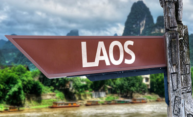 Obraz premium Laos wooden sign with exotic background