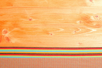 napkin on the bottom board on top of the yellow space for text