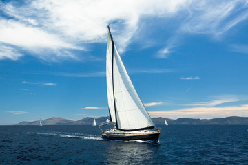 Fototapeta na wymiar Sailing yacht boat on ocean water, outdoor lifestyle. Luxury.