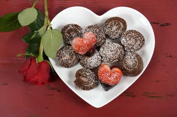 Valentine heart shaped strawberries with chocolate cake
