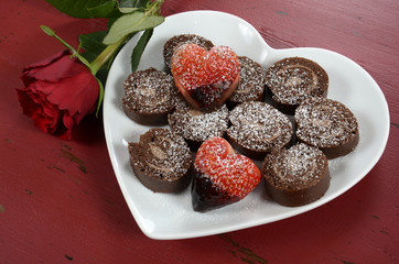 Valentine heart shaped strawberries with chocolate cake
