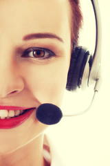 Young business woman at call center.