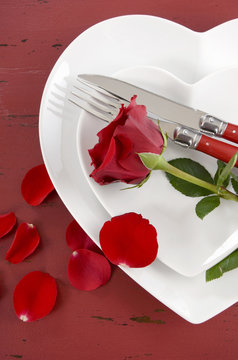 Valentines Day table place setting with red rose
