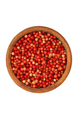 Cowberry in a ceramic bowl - isolated on white