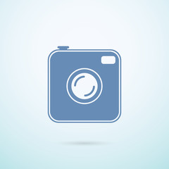 Old photocamera flat icon on blue background