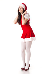 Young woman in Santa costume. Christmas.
