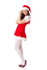 Young woman in Santa costume. Christmas.