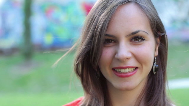 close up of beautiful smiling and  laughing young woman