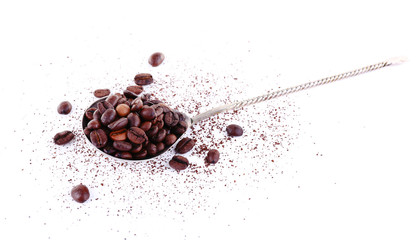 Coffee beans in spoon isolated on white
