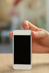 Hand holding smart mobile phone