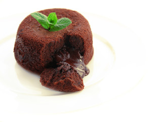 Hot chocolate pudding with fondant centre on plate, close-up