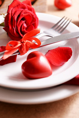 Festive table setting for Valentines Day on table background