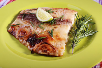 Dish of Pangasius fillet with rosemary and lime