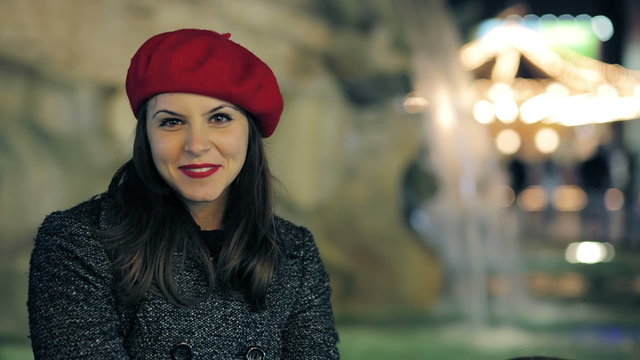 beautiful smiling young woman  -  fountain of gian lorenzo bernini in background
