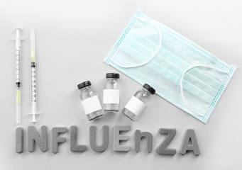 Medicines with word Influenza on light background