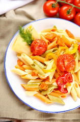 Pasta salad with pepper, carrot and tomatoes