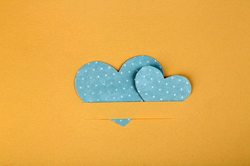 Paper hearts on beige background, close up