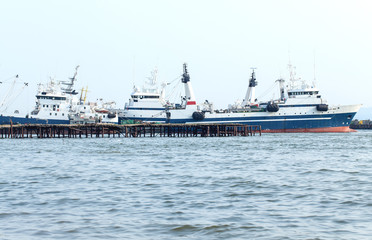 Fototapeta na wymiar Fishing vessels at a mooring