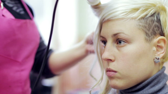 a woman gets to do a glamorous hairstyle - hairdresser - hairstylist