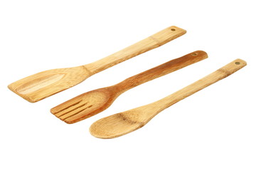 kitchen wooden utensils over white