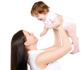 Happy mother with her cute baby having fun together