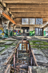 Inspection pit in a derelict workshop
