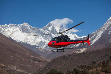 Lifeguard helicopter in Himalaya mountains in Nepal © Maygutyak