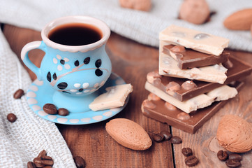 Chocolate bars with cup of coffee