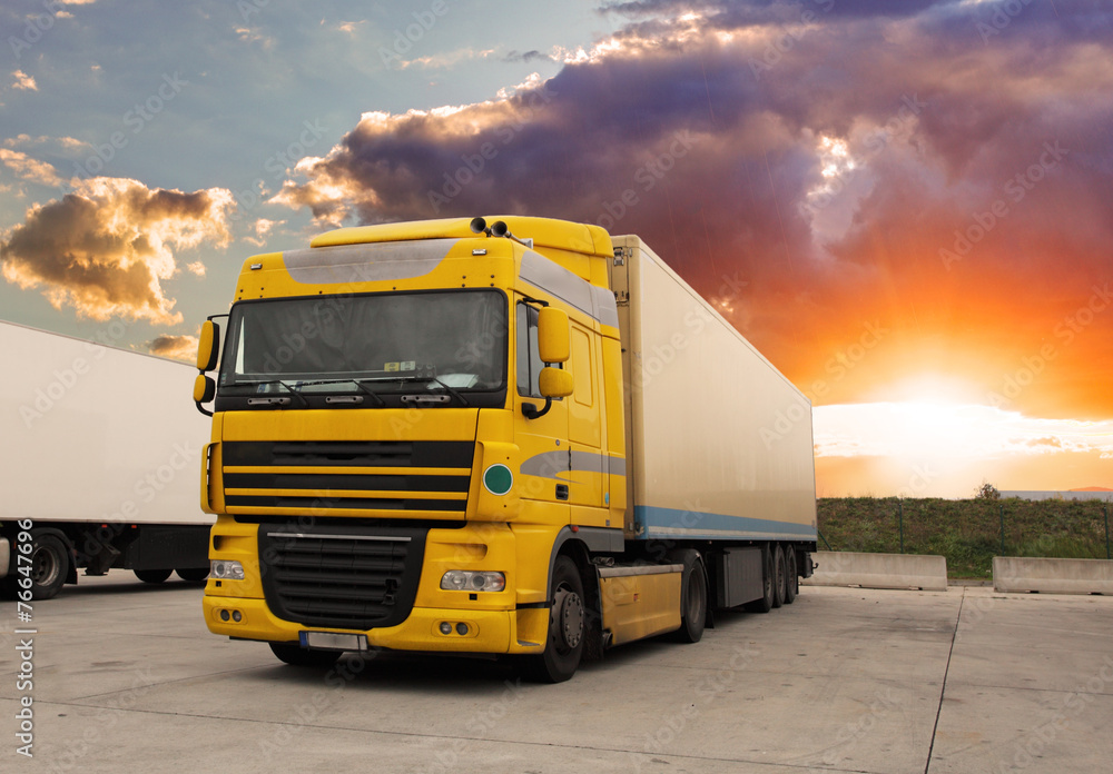 Wall mural truck - cargo transportation with sun