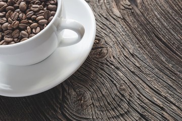 Cup of roasted coffeebeans