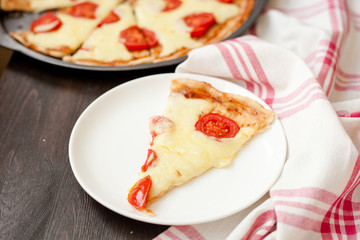 Italian pizza with mozzarella cheese and tomatoes, Margarita