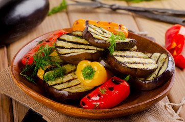Grilled healthy vegetables  on   wooden  plate.