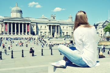 Girl on Trafalgar square in London