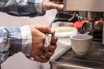 Barista steaming milk