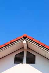 Gable of a House on blue sky background