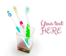 colorful family toothbrushes isolated on white background