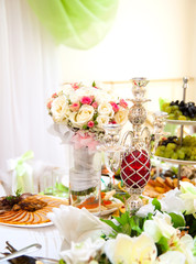catering table set service with silverware, napkin and glassware