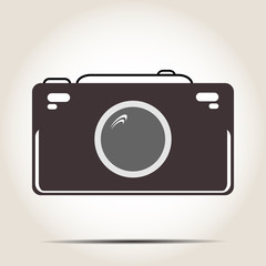 The camera icon on a gray background with shadow