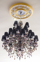 Black chandelier in interior