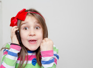 Little girl using phone