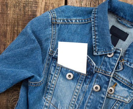 closeup of white blank with place for text in jeans jacket pocke