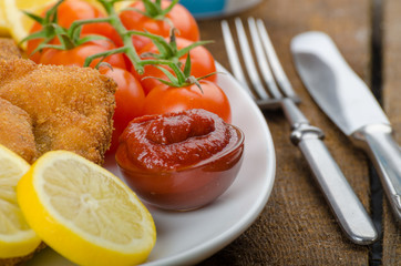 Big Chicken schnitzel with homemade chilli french fries