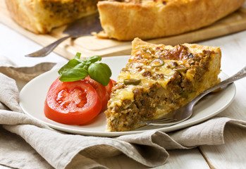 meat pie on a wooden background
