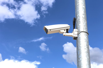 side view of a cctv on light pole with copyspace