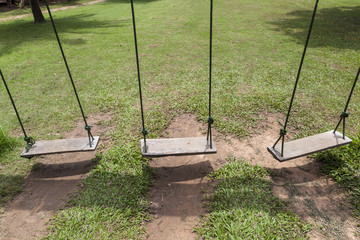 three swings in the garden
