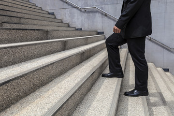 businessman walk up on stair background