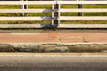 white fence and footpath