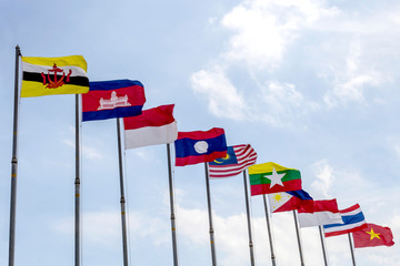National flags of Southeast Asia nations on blue sky background