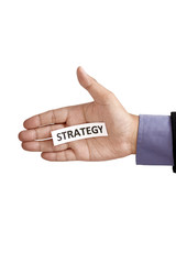 Hand Holding Paper With Strategy Text
