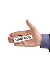Hand Holding Paper With Start Now Text